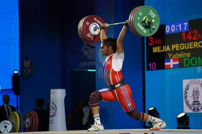 Yudelina Mejía hace historia como la primera pesista dominicana que gana oro en un Mundial Superior de Halterofilia Yudelina Mejía hace historia como la primera pesista dominicana que gana oro en un Mundial Superior de Halterofilia